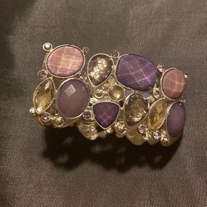 Purple bracelet. Never worn tags attached